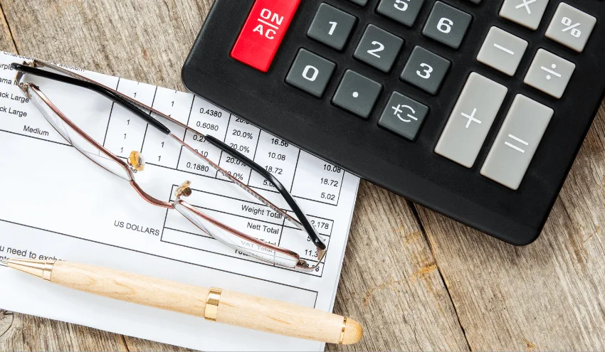 Stock image of calculator and paperwork