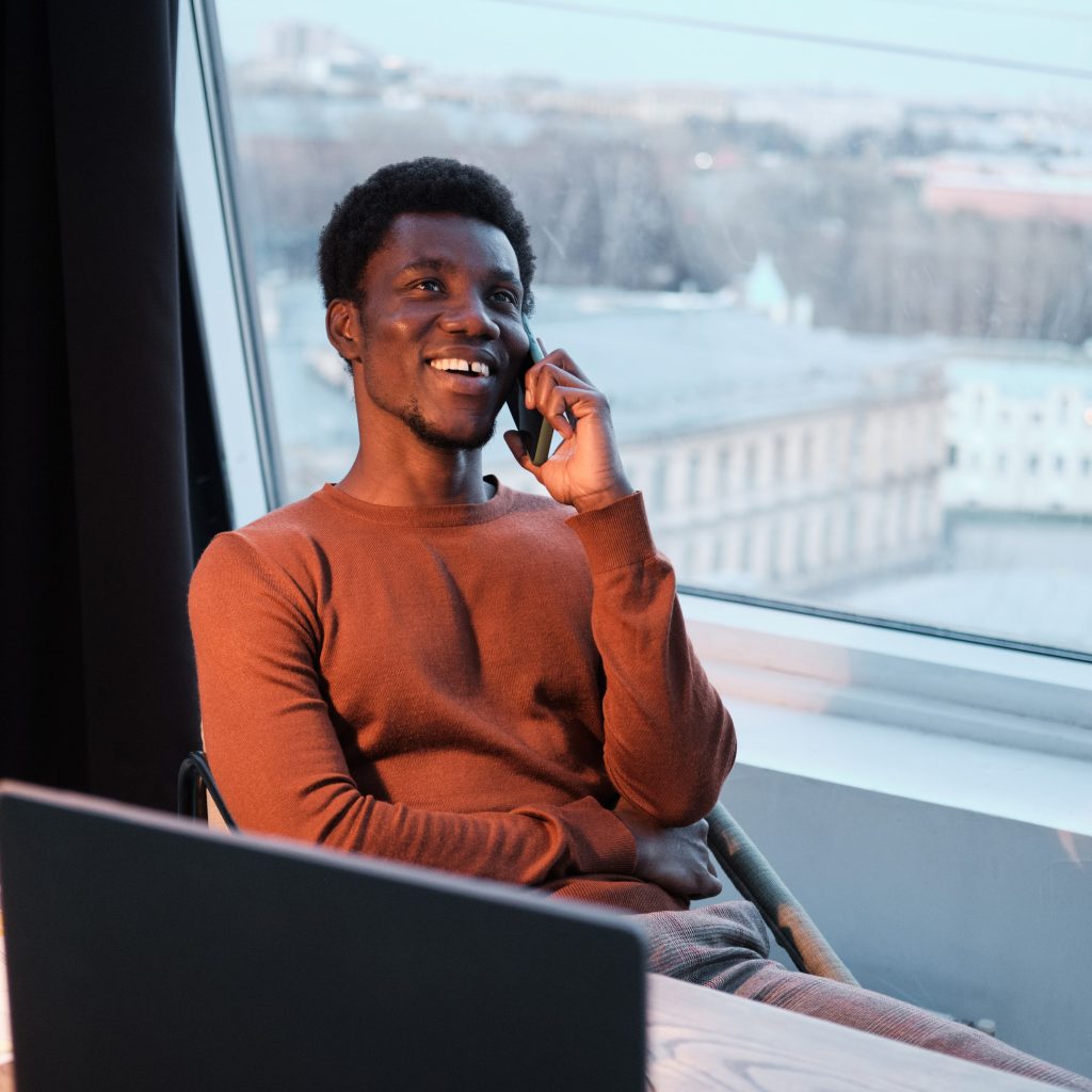 Broker Partnership - photograph of man using cell phone